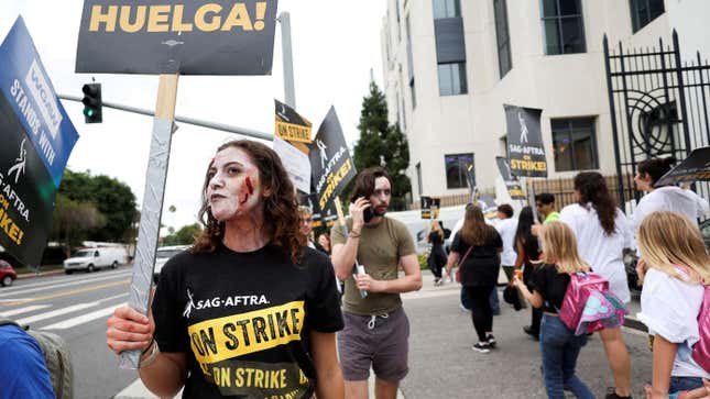 SAG-AFTRA members walk the picket line during their ongoing strike outside Sony Studios in Culver City, California, U.S. September 29, 2023.