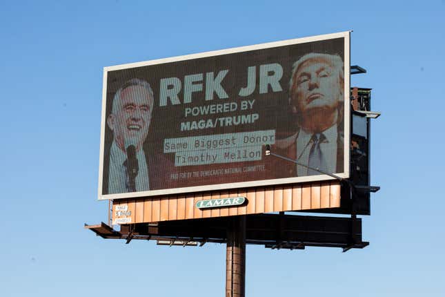 As Robert F. Kennedy Jr. campaigned in Grand Rapids, a billboard launched by the Democratic National Committee highlighted how Robert F. Kennedy’s Super PAC allegedly received millions from Donald Trump’s largest donor, Timothy Mellon on February 9, 2024 in Grand Rapids, Michigan. 