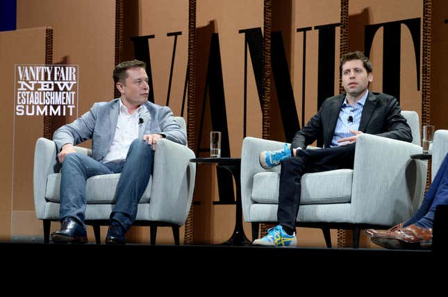 Elon Musk and Sam Altman sitting in grey arm chairs in front of a brown backdrop with giant black letters and a white sign that says Vanity Fair New Establishment Summit