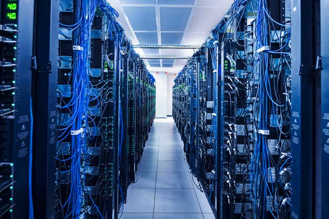 walkway between two rows of server racks